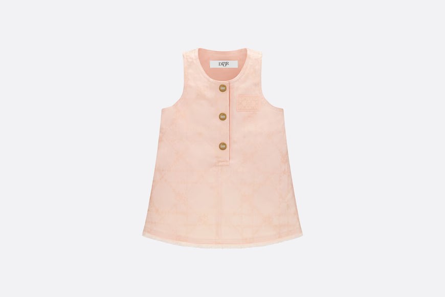 Wear a straight link skirt.  Peach cotton tarpaulin with light gold Cannage rattan case and star printing.  Numbering: 3SBM32DRSF_Y308